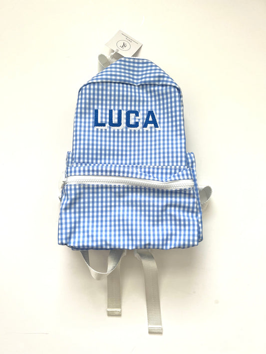 Kat font with blue ribbon and white thread
