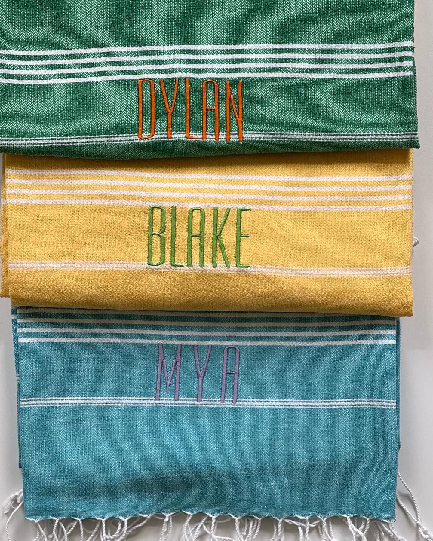 Grey font used. Orange, Green Mint and Amethyst thread colors used.