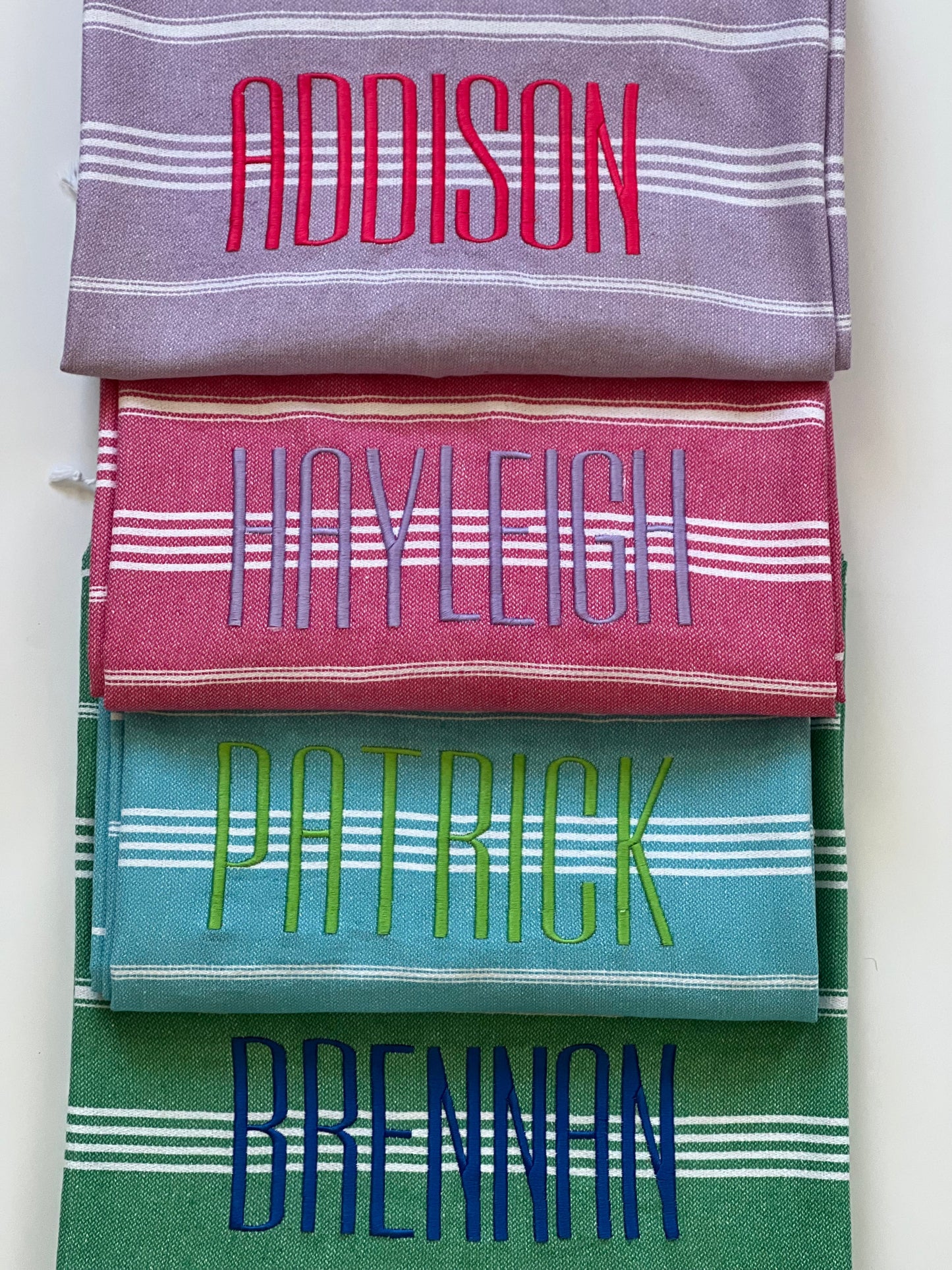 Grey font used. Tropical Pink, Amethyst, Bright Mint, Deep Oean thread colors.