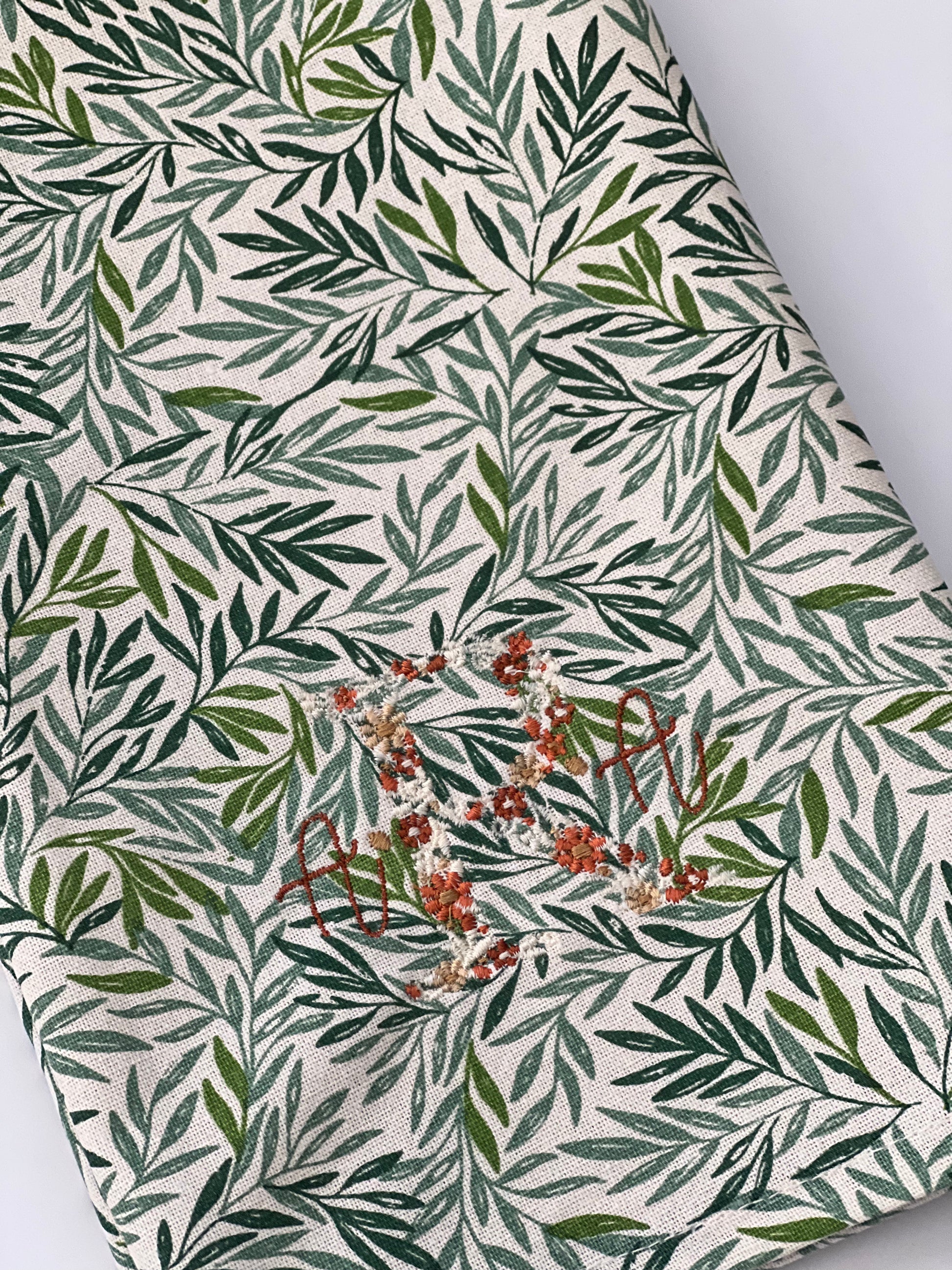 Floral initial with serena font in fall color palette