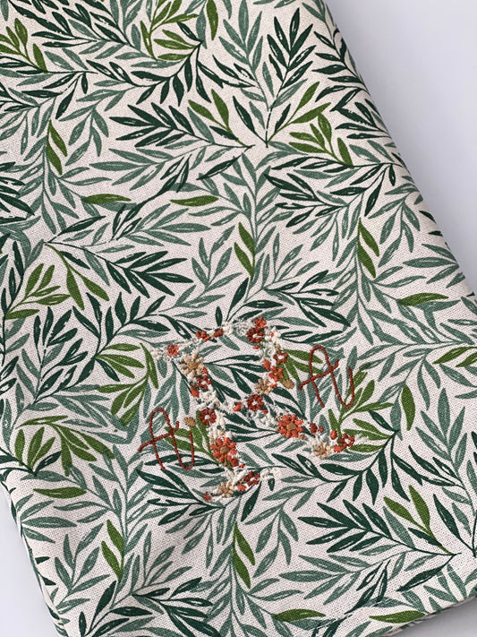 Floral initial with serena font in fall color palette